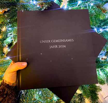 Фотокнига на замовлення преміум якості з послугою верстки макету